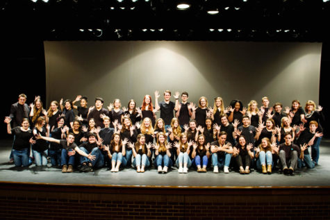 Coppell High School drama club poses for a club picture in the Black Box Theatre. Each year the club hosts a Dinner and a Movie event, which features a movie with food to watch the film. 