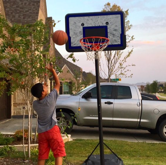 Lee Elementary fifth grader Neil Kaushik plays basketball after schools. Working out is a good way to clear your mind and improve your mood. 