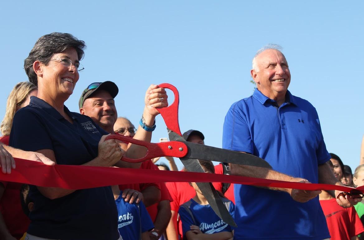 Coppell Mayor Karen Hunt and former Coppell Mayor Andrew Brown cut the ribbon at the grand opening of Andy Brown Park West on Saturday. The community came together to witness the official opening of the park. 