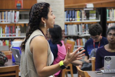 Coppell High Schools new librarian Cathy Arvizu tells students how to properly use research resources on Sept. 1 in Susan Sheppards third period IB Chemistry II class. Arvizu comes from an IB incorporated school, making her a great resource for research papers.