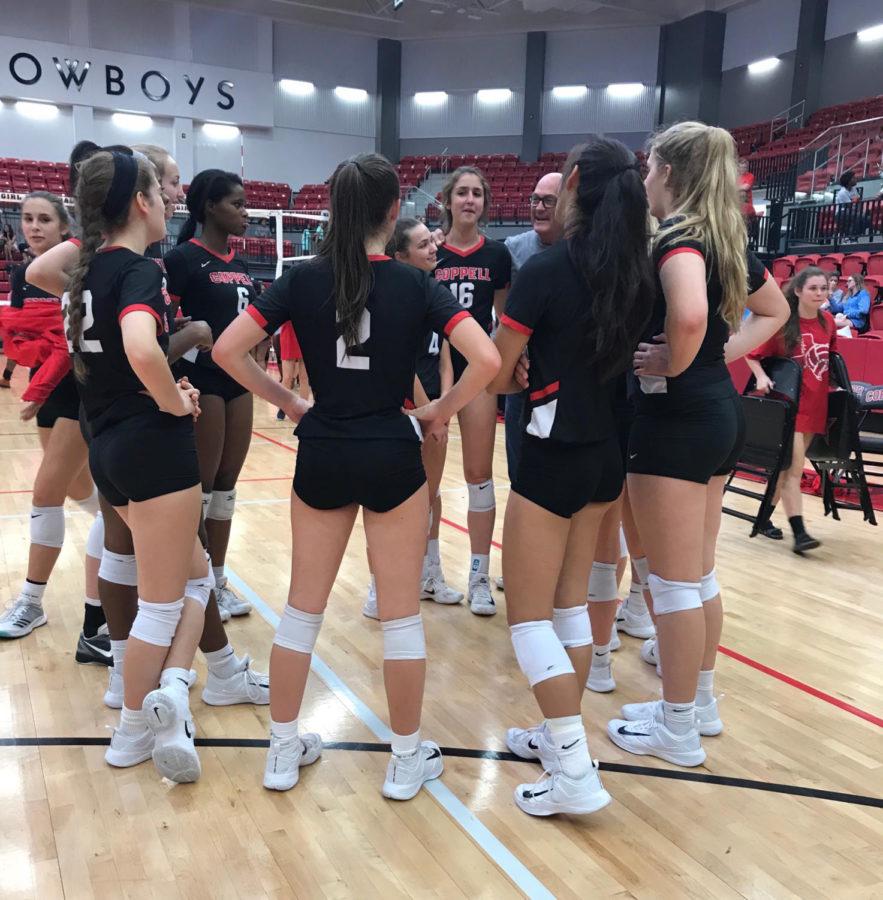 Coppell+Cowgirls+get+in+a+huddle+after+Friday+nights+game+in+the+arena.+The+Cowgirls+defeated+the+Longhorns+in+three+sets%2C+25-2%2C+25-4%2C+and+25-3.