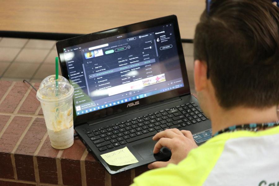 Coppell High School junior William Leslie spends his morning release period listening to showtunes on his laptop. This year, Coppell High School sophomores, juniors and seniors have the option of a release period in their schedule. 