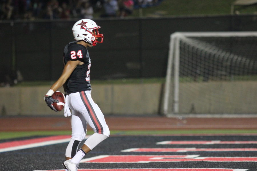 Coppell Cowboys senior wide receiver Gabe Lemons scores a touchdown, which helped in last week’s win over Lake Highlands. The Coppell Cowboys defeated the Wildcats with a final score of 49-34. 