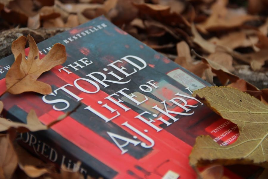Coppell High School senior Jess Hernandez makes book selections for the fall season. The fictional book The Storied Life of A.J. Fikry by Gabrielle Zevin is included in this selection.
