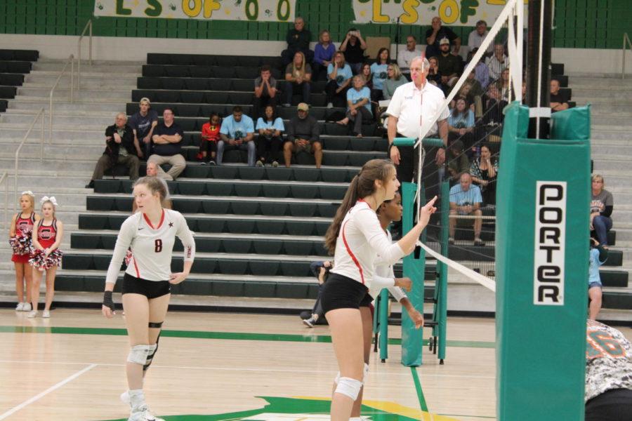 Coppell High School seniors Amanda Colon, Riley Ross and junior Amarachi Osuji play defense  against Lebanon Trail High School  Monday night at Frisco Lebanon Trail’s gymnasium. The Cowgirls defeated the Lady Rangers in  three sets 25-8, 25-15, 25-20 to advance to the area round of the 6A state playoffs.
