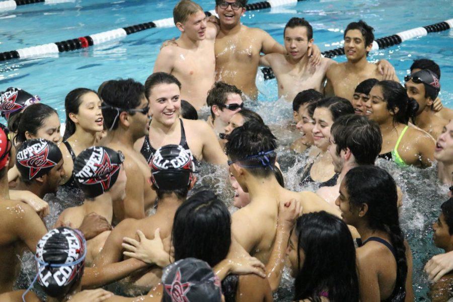 Coppell High School swimmers do their team chant before the meet at the YMCA. Coppell High Schools swim team competed Friday  in the Vaquero Battle Meet. 
