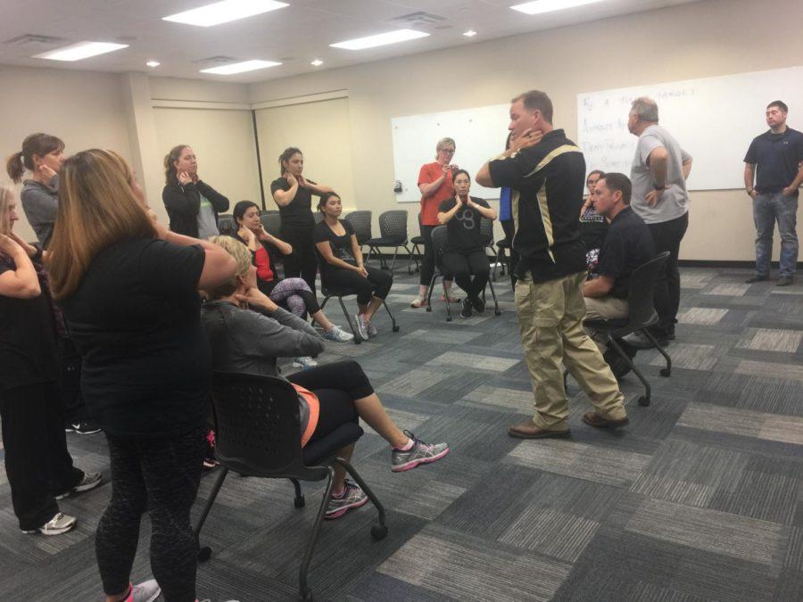 The 14 girls participating in the women’s self defense class practice using pressure points. Pressure points can knock out the attacker with a simple hit. The classes take place at the Coppell Police Department on Wednesday’s from 6:30 - 8 p.m.