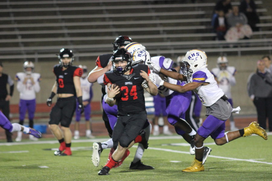 Coppell Cowboys junior running back Ryan Hirt runs ball in hand as he makes his way to the end zone during the first quarter on Nov. 10 at Buddy Echols Field. The Coppell Cowboys defeated the Richardson Eagles, 49-14. 