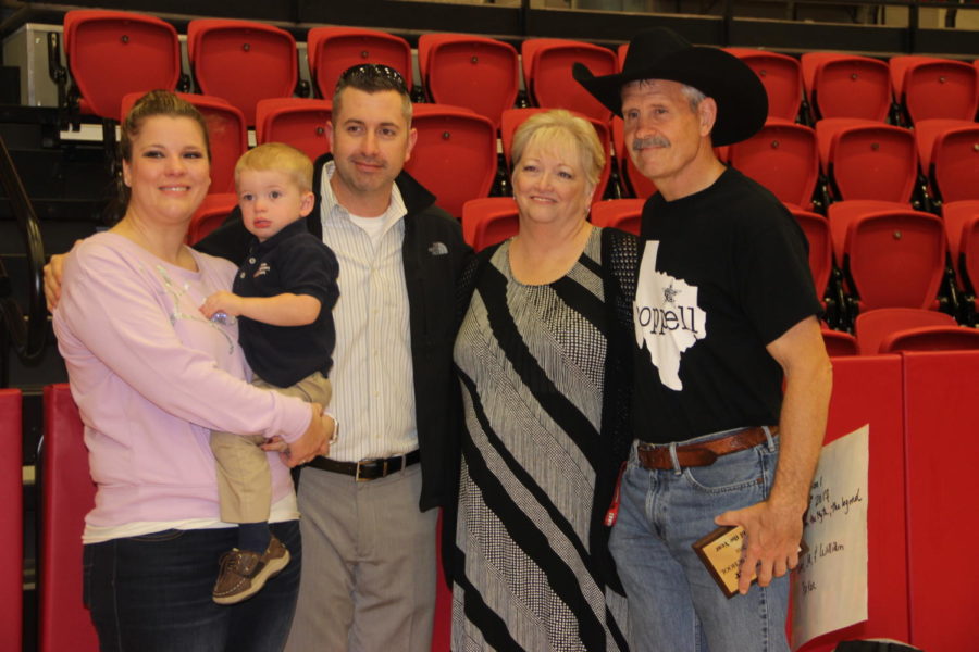 The family of Coppell High School weightlifting coach and outdoor adventures teacher Bill Parker supports him at the Teacher of the Year ceremony in the CHS Arena on Dec. 4. Bill Parker was awarded as Teacher of the Year for 2017 for his exemplary work ethic and success as a teacher and coach.
