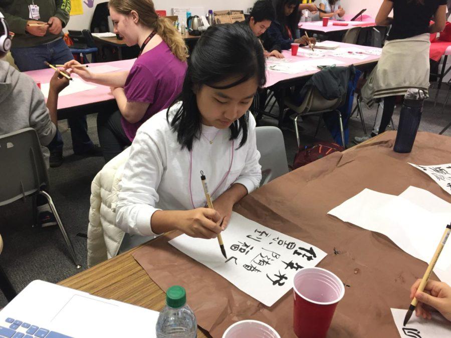 Coppell High School junior Jeongmin Park practices chinese calligraphy before creating her spring festival couplets during second period. Chinese II students are practicing chinese calligraphy and creating spring festival couplets for Chinese New Year. 