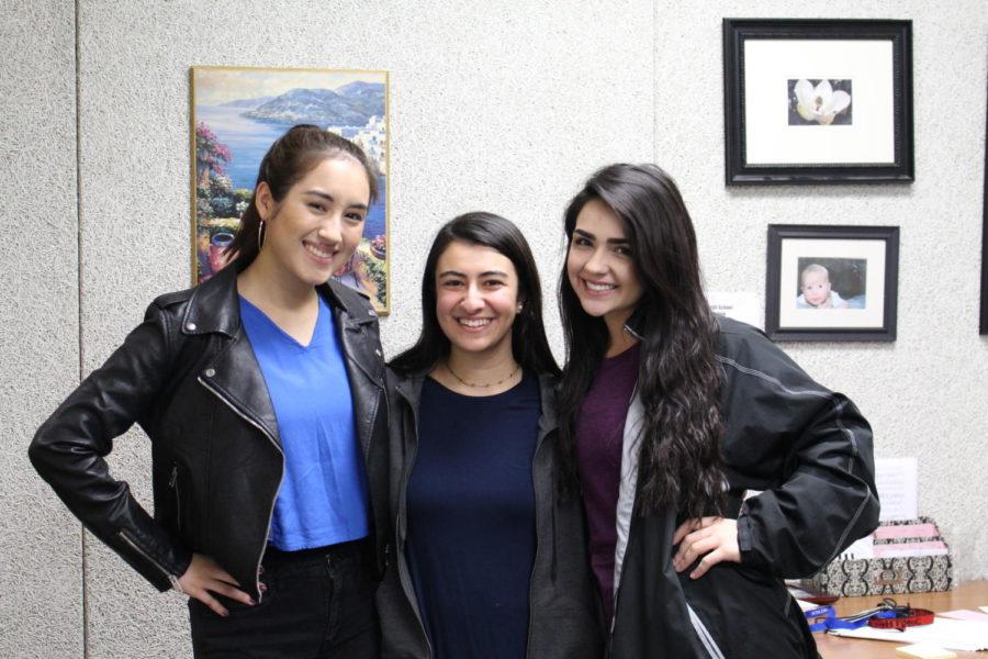Coppell High School Choir junior Arzue Shakeri, senior Ashley Benhayoun and senior Tori
Kennedy smile during 7th period after placing in the All-State Choir. The All-State Choir is a
group of highly selected individuals who show certain talents which are brought together to form
choirs such as the Treble Choir, Mixed Choir and many more.