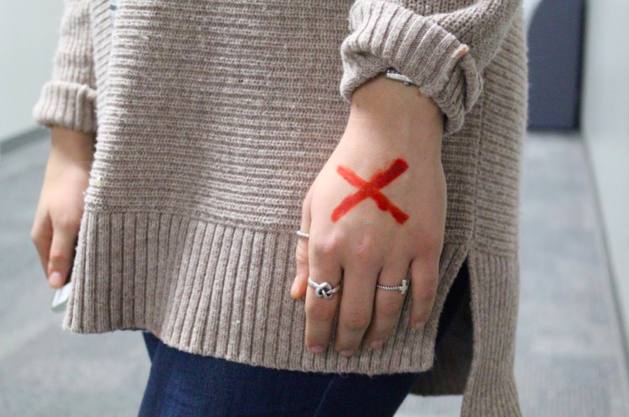 Senior Lauren McCord drew a red X on her hand in support of the END IT movement. The END IT movement brings awareness to the issue of human trafficking. 