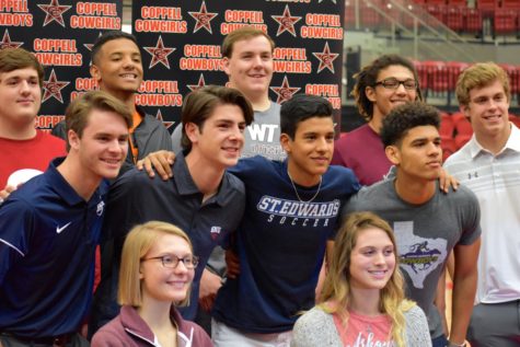 Coppell athletes smile for the camera after signing their letters of intent during the National Signing Day on Feb. 7. Athletes are looking forward to playing at their intended college this upcoming semester in order to pursue their passions.
