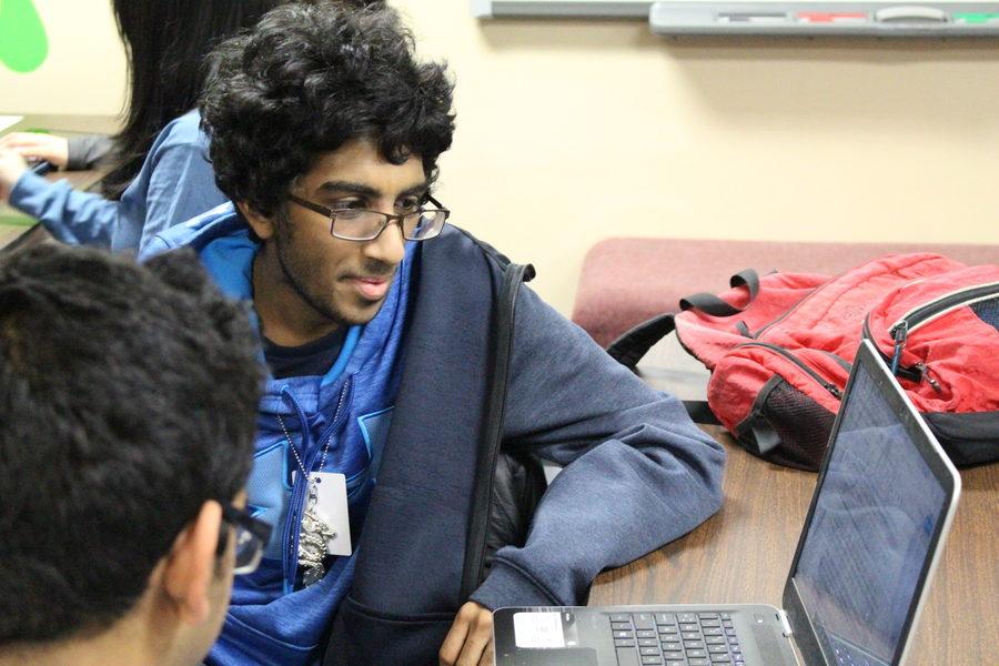 Coppell High School junior Ahilesh Vasudaven and Marcus Munshi review over Ahilesh’s story before submitting to Coppell Literary and Art Magazine during creative club. The Coppell High School Creative Writing Club meets every Tuesday afternoon in C231.