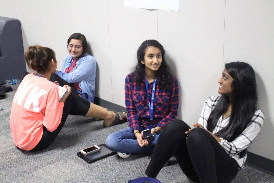 Coppell High School IB junior students Anu Uppal, Karvi Bhatnagar, Dwija Dammanna and Sahana Ramasamy chat in the hallway during sixth period on International Women’s Day. International Women’s Day is celebrated on March 8 yearly to honor the movement of women’s rights in America.
