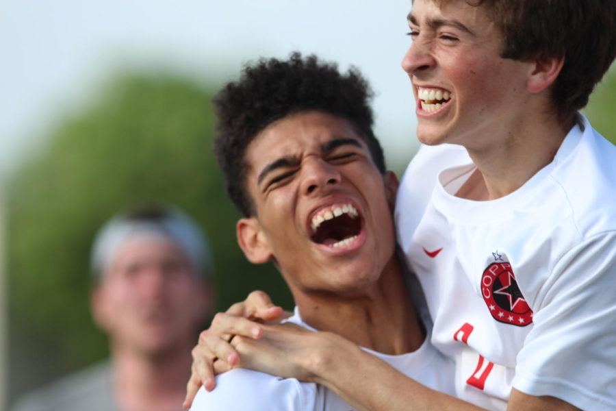  Coppell Cowboys senior center forward Francisco Redondo and junior forward Joe Ruedi celebrate after the Cowboys scored a goal during the second period of overtime at Kelly Reeves Athletic Complex in Round Rock this afternoon. The Coppell Cowboys defeated the Spring Woods Tigers 1-0 in the Region II 6A Soccer Tournament.