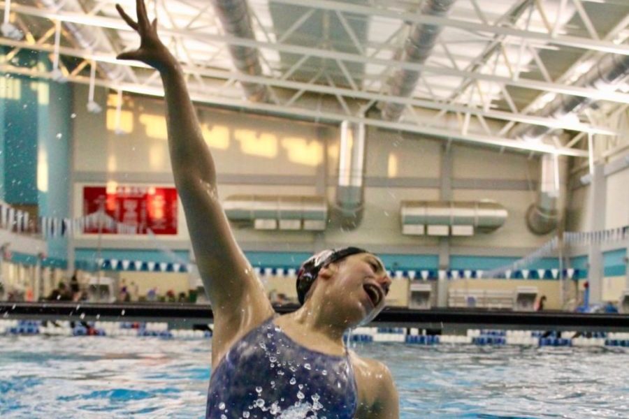 Coppell High School senior Lili Lomas performs a synchronized swimming jump at Westside Aquatic Center in Lewisville. Lomas has enjoyed being a part of this sport for several years and is finding a happy ending to her career.