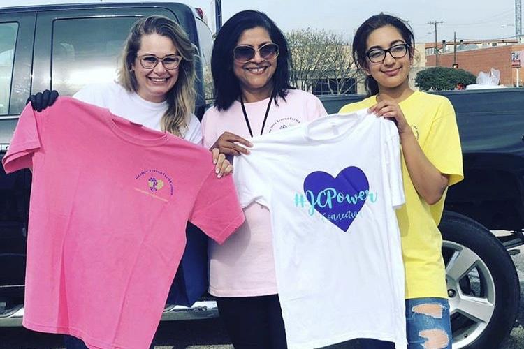 Sandy Galaviz, Bharti Shah and Coppell High School junior Shania Khan serve food to the homeless in downtown Dallas on March 24. Khan and her mother went to Dallas as part of Khan’s organization, the Mother Teresa Food Pantry.
