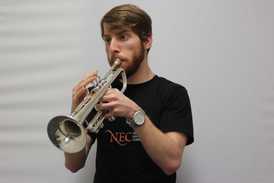 Coppell High School senior Grant Knippa practices trumpet in the CHS band hall practice rooms during sixth period. Knippa plans to attend New England Conservatory of Music in Boston to pursue a career in classical music. 