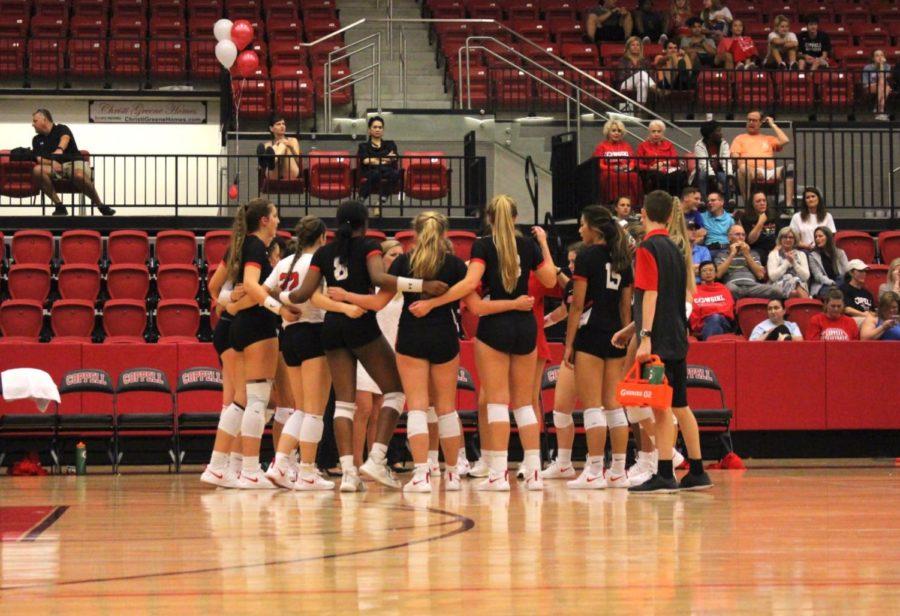 The Coppell High School varsity volleyball team huddled together to pray before its game against the McKinney Lady Lions. The Lady Lions took the victory in four sets last Tuesday in the CHS Arena.