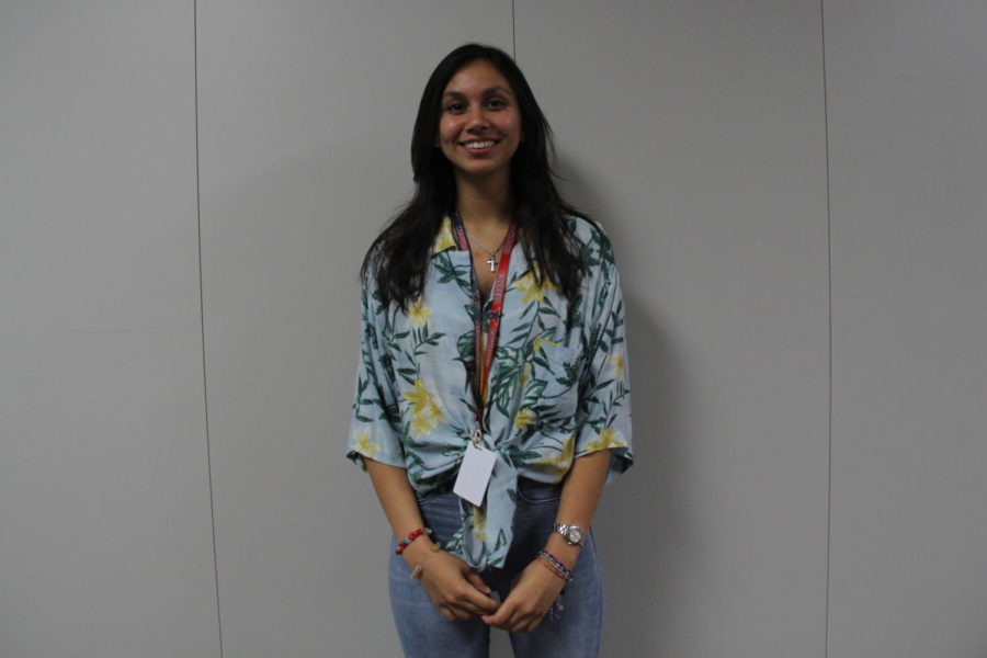 Coppell High school senior Michaela Skalski poses in her hawaiian shirt for Maui Monday at Coppell High School. Student Council is promoting homecoming by having different dress up themes everyday for homecoming week. 

