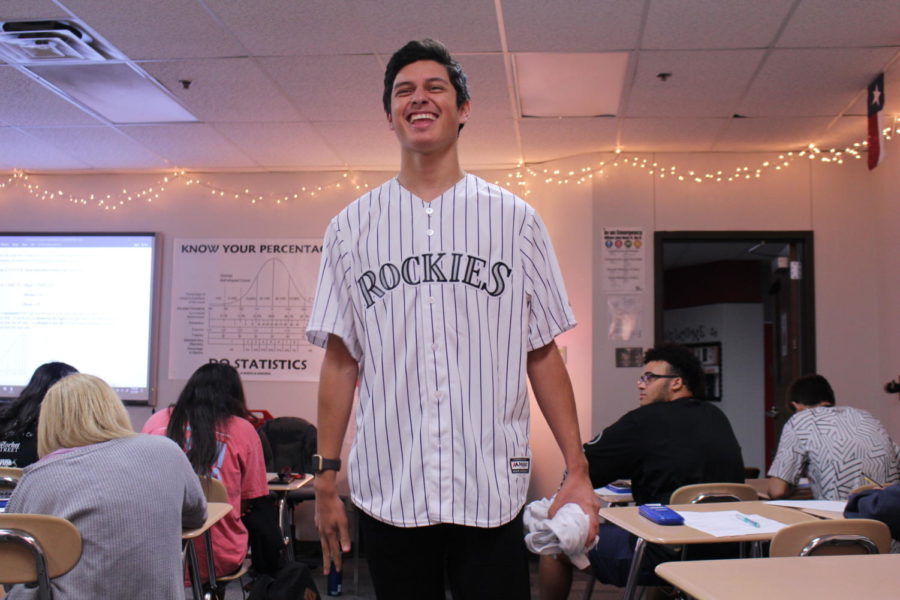 Coppell+High+School+senior+Taylor+Ortiz+wears+his+favorite+Rockies+jersey+in+Johnson%E2%80%99s+STATS+class+on+Sep.+27.+Student+Council+is+celebrating+homecoming+week+by+selecting+a+different+dress-up+theme+for+each+day+this+week.