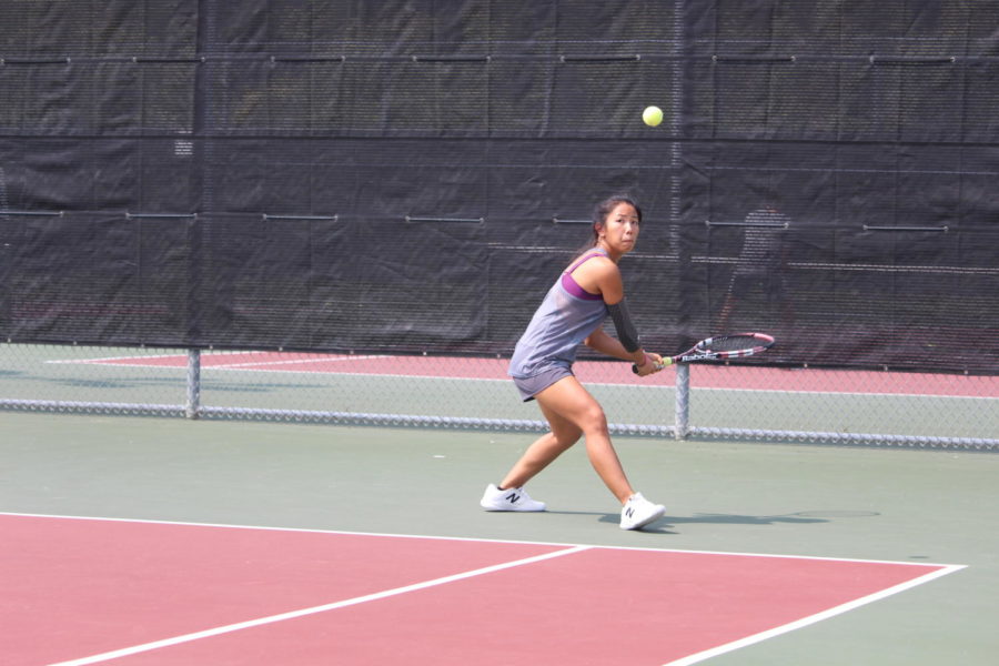 Coppell senior Sydney Nguyen returns a shot during practice earlier this season. The tennis team is facing Marcus tomorrow with their finalized doubles lineup, and is expecting a challenging match. 

