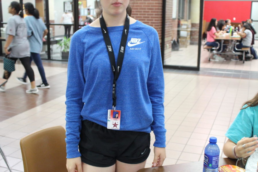 During C lunch, Coppell High School students wear Nike merchandise in the cafeteria on Sep. 12. Students wear Nike merchandise including clothes, shoes, and lanyards.  Photo by Gabby Nelson. 