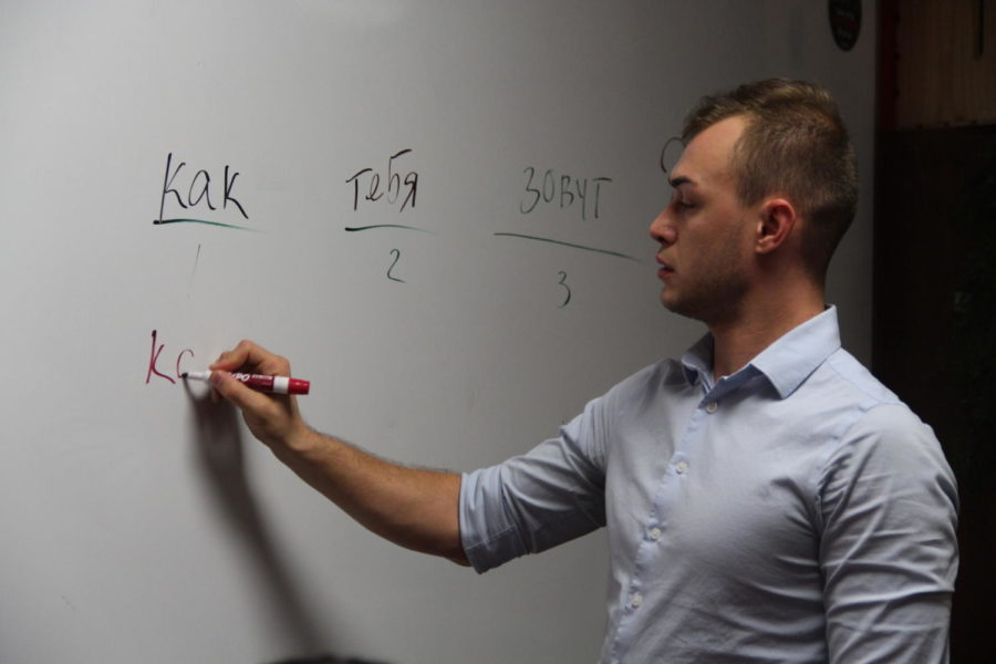 Coppell High School teacher Michael Egan teaches the members of Russian club the basics of the language after school. Egan is fluent in six languages, with Russian being his first language.
