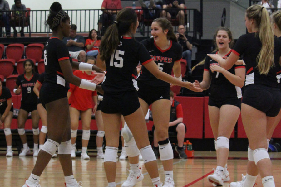 Coppell sophomore middle blocker Madison Gilliland celebrates after a game winning point tonight at the CHS arena on Tuesday. The Cowgirls defeated Keller Central, 25-16, 25-13, 25-17. Photo by Sujeong Oh.