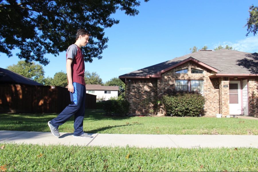 The Sidekick Entertainment Editor Anthony Cesario goes for a walk on Sunday in his neighborhood. Walking has benefitted Cesario through decreased stress, improved mood and a greater appreciation for the outdoors.