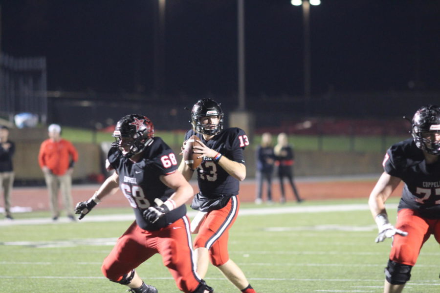 Coppell junior quarterback Drew Cerniglia sets up to throw a pass against Marcus at Buddy Echols Field on Oct. 19. The Cowboys will play Irving tonight at 7 p.m. at Joy & Ralph stadium in Irving.