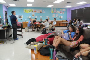 During seventh period, student council adviser Jonathan Denton discusses upcoming plans for student Council. Student councils members are preparing for homecoming and upcoming by taking notes and listening to Mr. Denton.