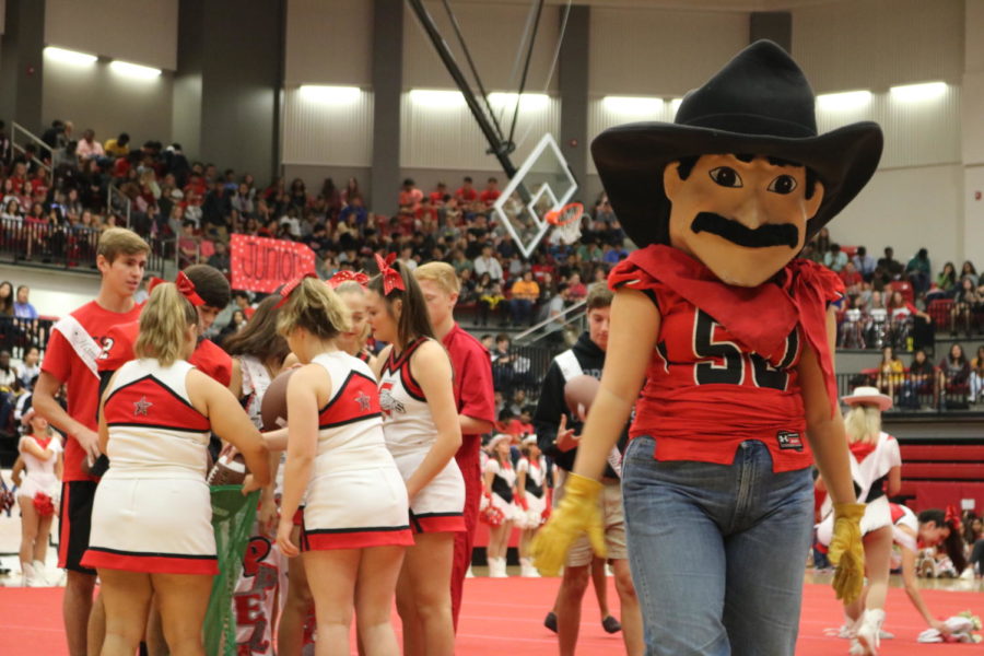 Carl the Cowboy was a source of enthusiasm and spirit at Friday morning’s homecoming pep rally in the Arena, which included activities such as a football throw from the homecoming court. The homecoming pep rally hyped up students for the upcoming football game against MacArthur on Sept. 28 at Buddy Echols Field and the homecoming dance on Sept. 29.