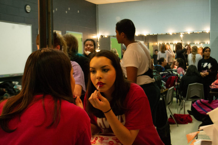 Coppell High School junior Sophia Sircar prepares for the dress rehearsal backstage for “All Shook Up”. Guest can attend the musical this Friday, Saturday and Sunday and as well as Nov. 3- 4.  Photo by Camila Flores.
