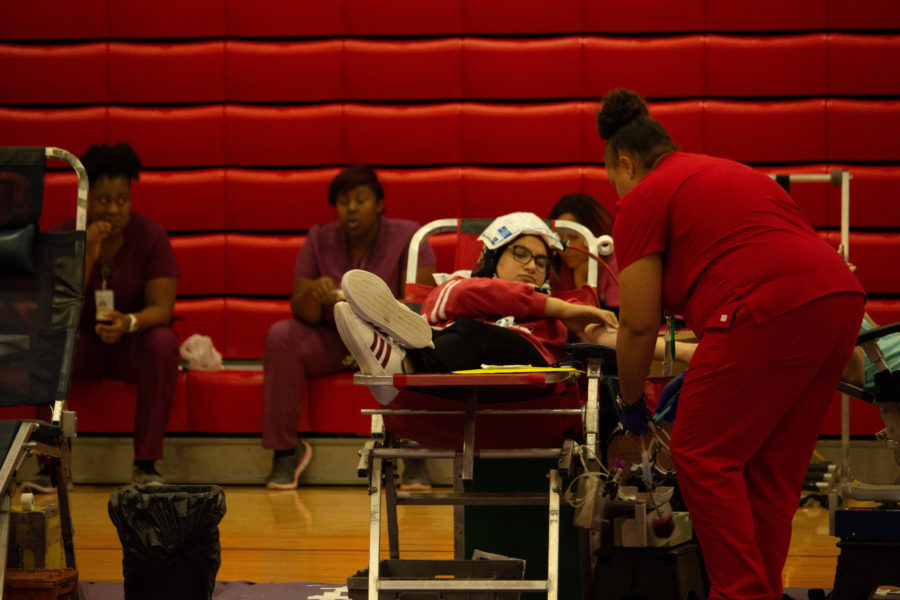 On Oct. 26, Coppell High School junior Saha Saleh gets her blood drawn at the blood drive. The blood drive was held by HOSA and took place all day in the small gym. 