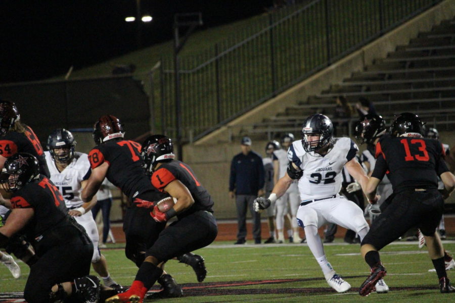 Coppell senior De Heath carries the ball to score a touchdown on Friday Nov. 2 at Buddy Echols Field. The Cowboys lost to Flower Mound, 31-17. 