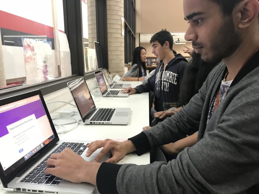 Coppell High School senior Tanay Pradhan selects candidates on the Texas Gubernatorial Mock Election google form in the CHS library in Bybiana Houghton’s AP Government class during eighth period. Voting is open all day with students requiring their student ID’s to vote.