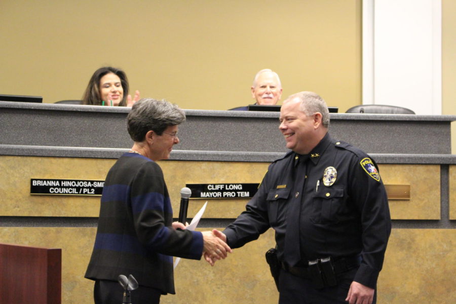 During the Coppell City Council meeting on Dec. 12, Mayor Karen Hunt swears in new Police Chief Danny Barton. City chairs Brianna Hinojosa-Smith and Cliff Long, as well as other members of the council, are present as Barton is officially sworn in during the public ceremony.
