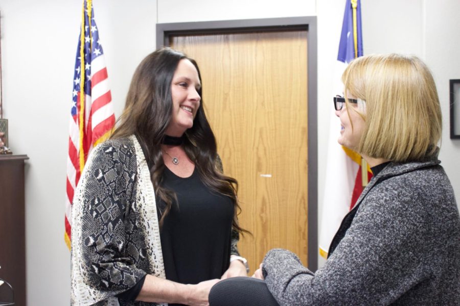 Coppell High School administrative assistant to the principal Amy Stroh talks with CHS administrative assistant to associate principals Lynn Anderson. Stroh’s promotion came after the former principal’s secretary, Terry Phillips, retired in December.