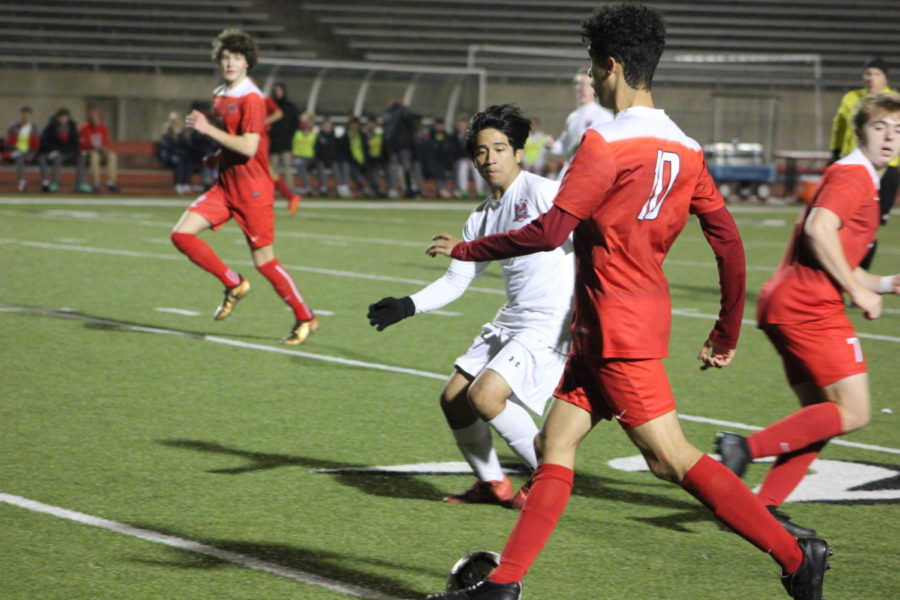 Coppell senior, Caleb Razo runs the ball past McKinney Boyd during the game on Jan.15th against McKinney Boyd, at Buddy Echols Field. The Cowboys play Flower Mound on Friday at 7:30 p.m. at Buddy Echols Field.