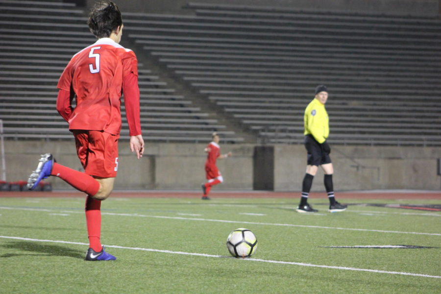 Coppell junior Nathan Hernandez dribbles upfield during a match against McKinney Boyd, at Buddy Echols Field. The Cowboys will play against Falcons tomorrow at 7:30 p.m. at Buddy Echols Field.
