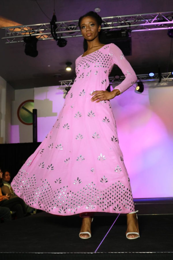 Bella Modeling School recruit Angelica Franklin walks the runway in Fashion Fiesta at Shots by Bhavya 1st Annual Fashion at Ervay Theater on Feb. 10. Coppell High School senior Bhavya Vasireddy presents a cultural fashion show with designers in the metroplex.