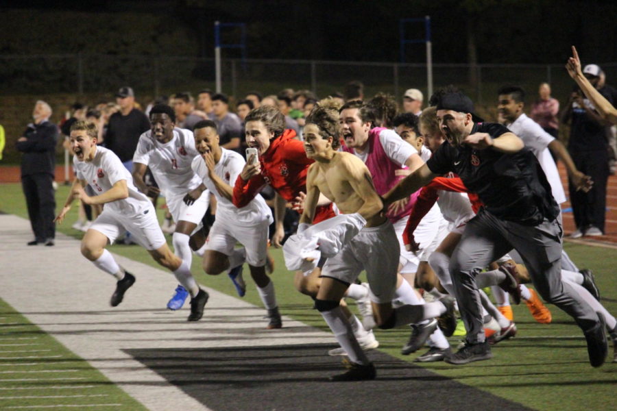  The Coppell boys soccer team celebrates after senior goalie Austin Simigian blocks Denton Guyer’s Penalty kick to steal the victory for the Cowboys at Falcon Stadium in Lake Dallas. After a scoreless regulation and two overtime periods, Coppell won,  0-0 (4-3), in the Class 6A Region I bi-district match