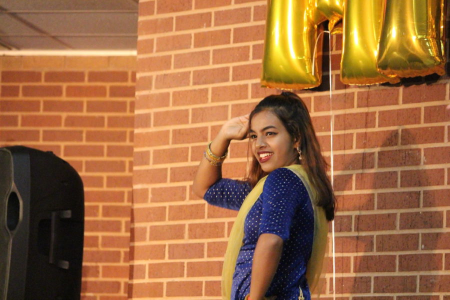 Coppell+High+school+junior+Shreshtha+Ray+dances+at+Heritage+Night+2018+in+the+CHS+commons.+On+Heritage+Night%2C+people+of+different+heritages+show+culture+through+dancing%2C+singing+and+other+performances.+Heritage+Night+is+tonight+in+the+CHS+commons+at+6+p.m.