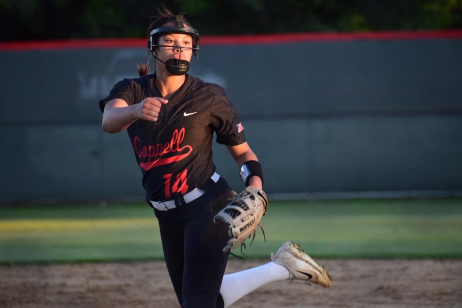 Coppell+senior+pitcher%2Fcenterfielder+Nora+Rodriguez+pitches+the+ball+to+her+opponent+at+the+game+against+Keller+at+the+Colleyville+Heritage+High+School+on+Friday.+The+Cowgirls+lost%2C+5-2%2C+as+their+season+ended+in+the+first+round+of+playoffs.