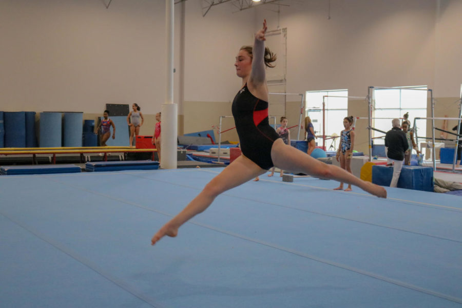 Coppell High School sophomore Tallulah Rushton practices her routine at Texas Dreams Gymnastics on March 18. Tallulah heads to the gym from 7 a.m. to 11 a.m., and her training consists of conditioning, vault, beams and floor.