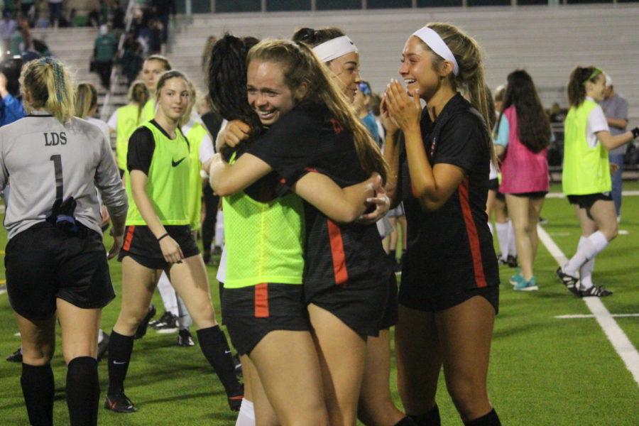 Coppell senior forward Rebecca Watley and junior midfielder Margaret Roberts get emotional after the Cowgirls were eliminated from the playoffs at Broncos Field on Friday. Carroll defeated Southlake Coppell., 3-1. 