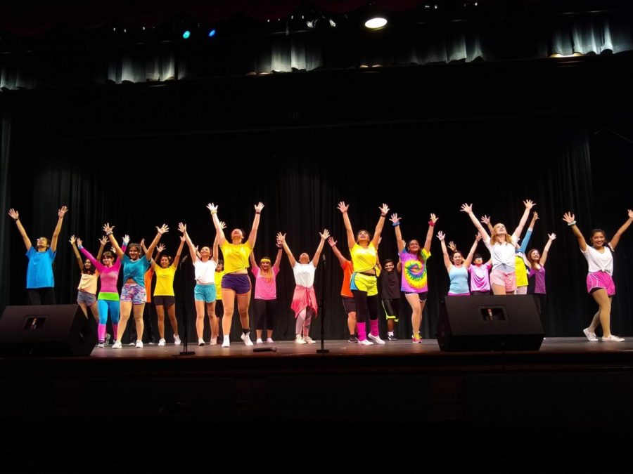 Vivacé! members finish the final song, “We Got The Beat/You Can’t Stop The Beat”, at the “We Are Family” show on Saturday at CHS auditorium. The Vivacé! members performed a variety of songs about togetherness and the power of love.