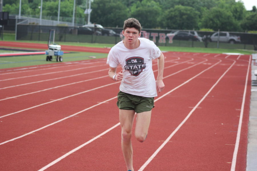 Coppell High School junior Jackson Walker practices running before school Tuesday morning at the Buddy Echols Track. Walker is preparing for the state track meet this weekend.
